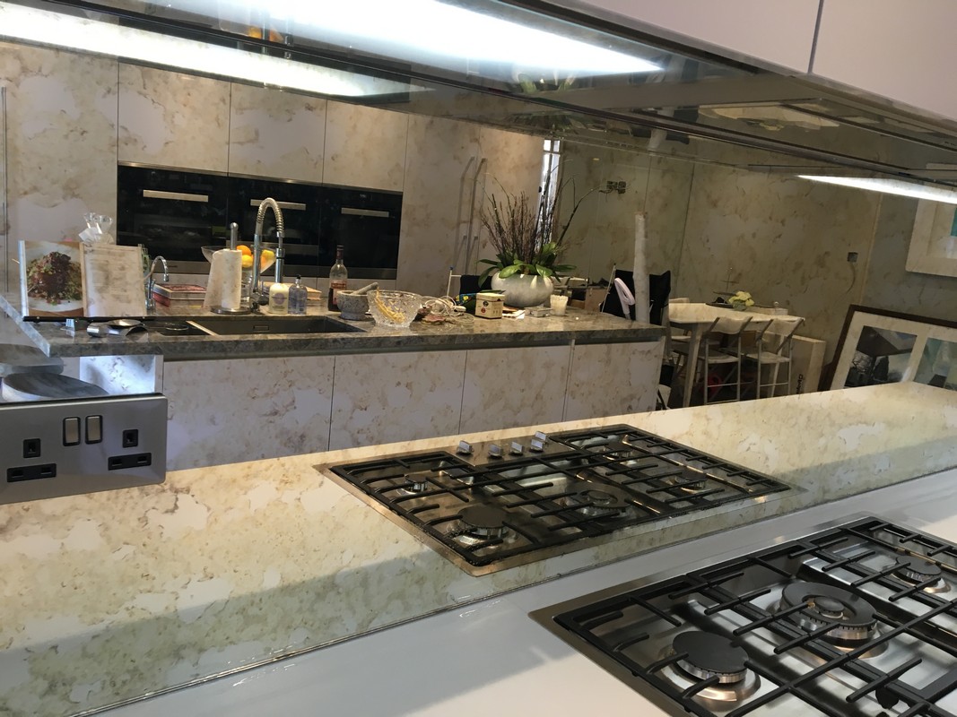 Mirror glass splashback in Tooting luxury kitchen