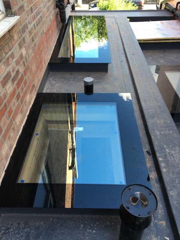 Multiple flat roof skylights on extension in Tooting
